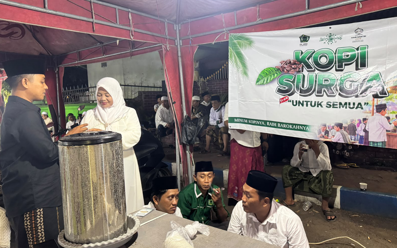 stan bertajuk Kopi Surga ISNU Sumenep di malam puncak Hari Santri Nasional (HSN) 2026.